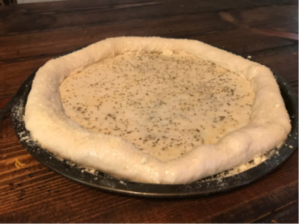 Stuffed crust pizza with oil and herb base